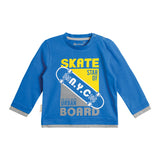 POLERA JERSEY ALGODÓN BROCHE EN HOMBRO